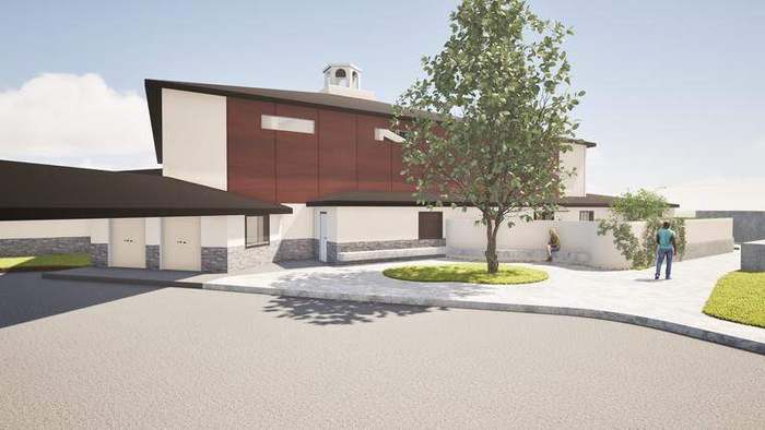 Rendering of the Maxine Thurman Caruth Courtyard, with a tree, low seating walls and planting